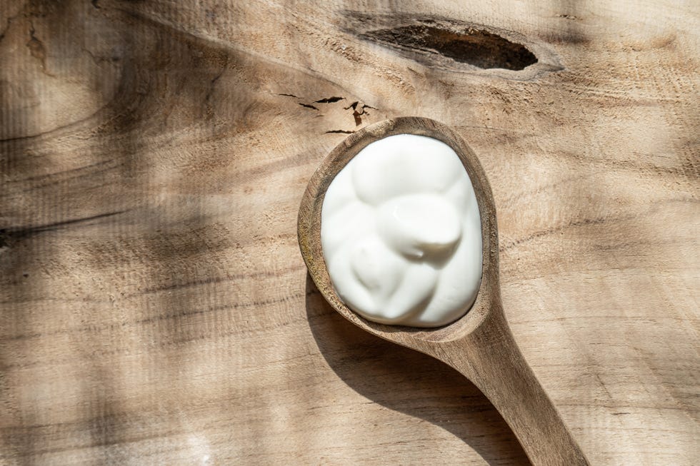 healthy breakfast with fresh greek yogurt on background