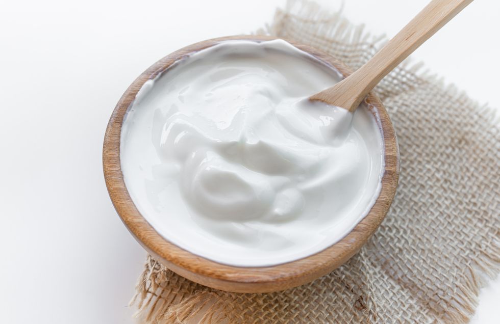 healthy breakfast with fresh greek yogurt on background