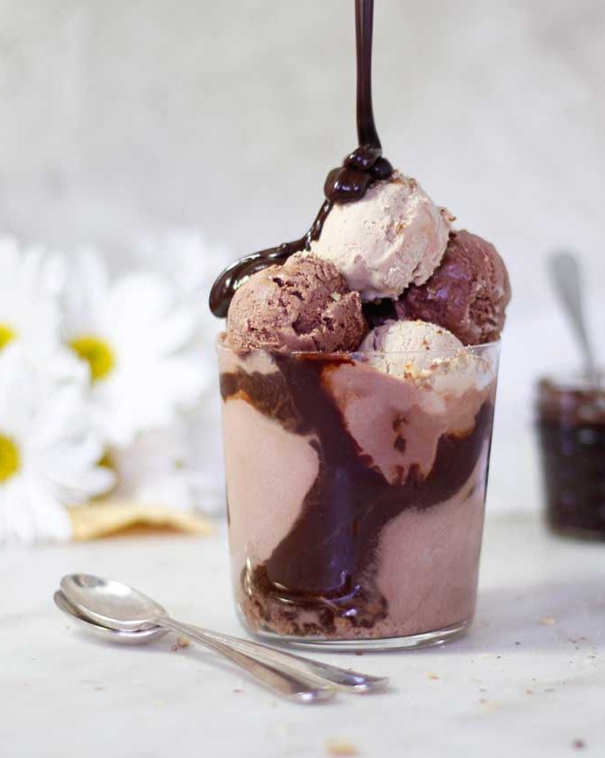 chocolate blender ice cream in glass cup with hot fudge