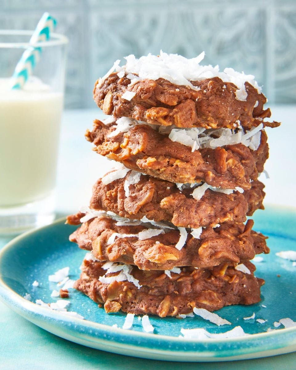 no bake chocolate oatmeal cookies stacked on blue plate