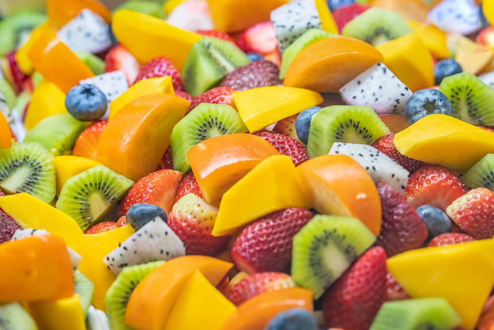 healthy fresh fruit salad on white background top viewfruit background