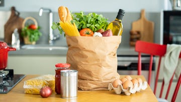 bag of healthy groceries on a kitchen table