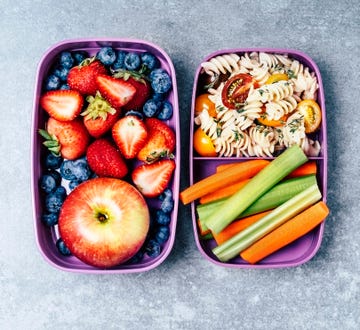 healthy kids school lunch with berries, pasta salad, and veggie sticks