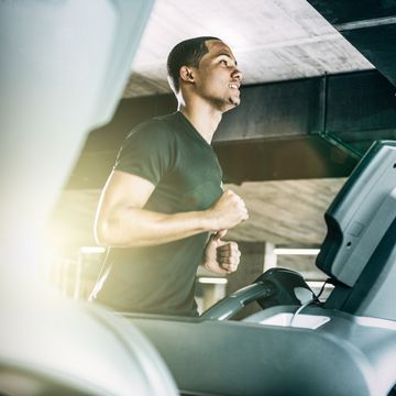 healthy man running on treadmill
