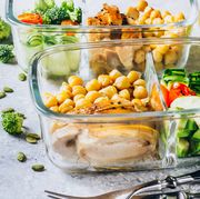 healthy meal prep containers chicken and fresh vegetables