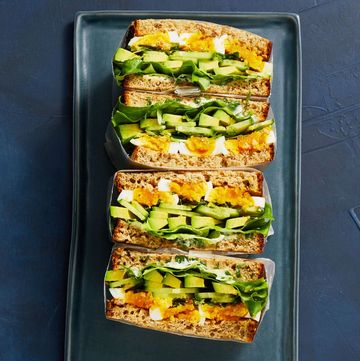 stacked sandwiches with hard boiled eggs and avocados
