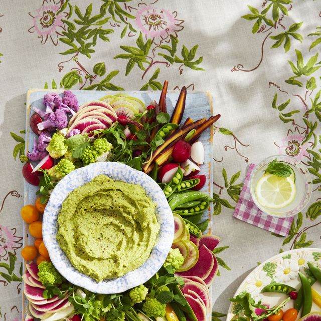 spring crudités board with white beanandpea dip