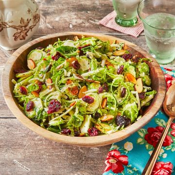 healthy thanksgiving brussels sprouts salad in wood bowl