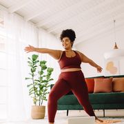 healthy woman training at home, yoga to boost heart health