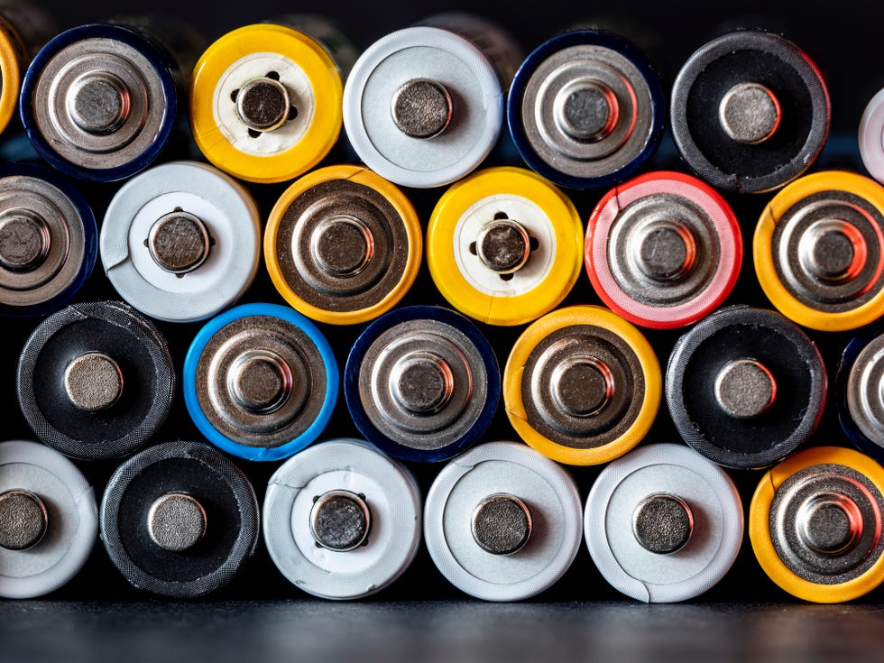 heap of rechargeable batteries of differentes sizes, nimh rechargeable