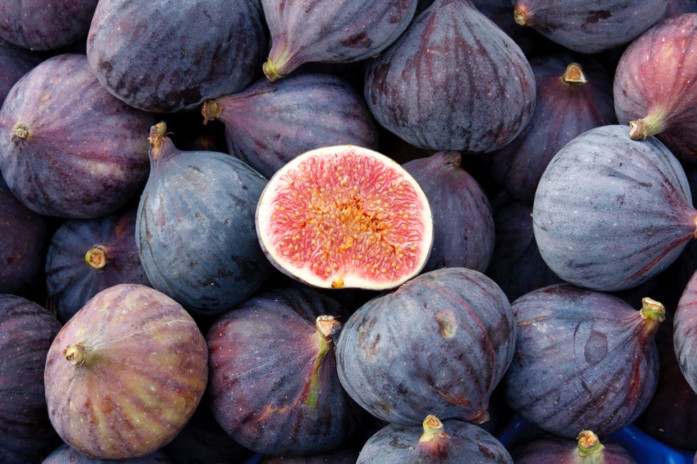 heap of tasty organic figs at local farmers market