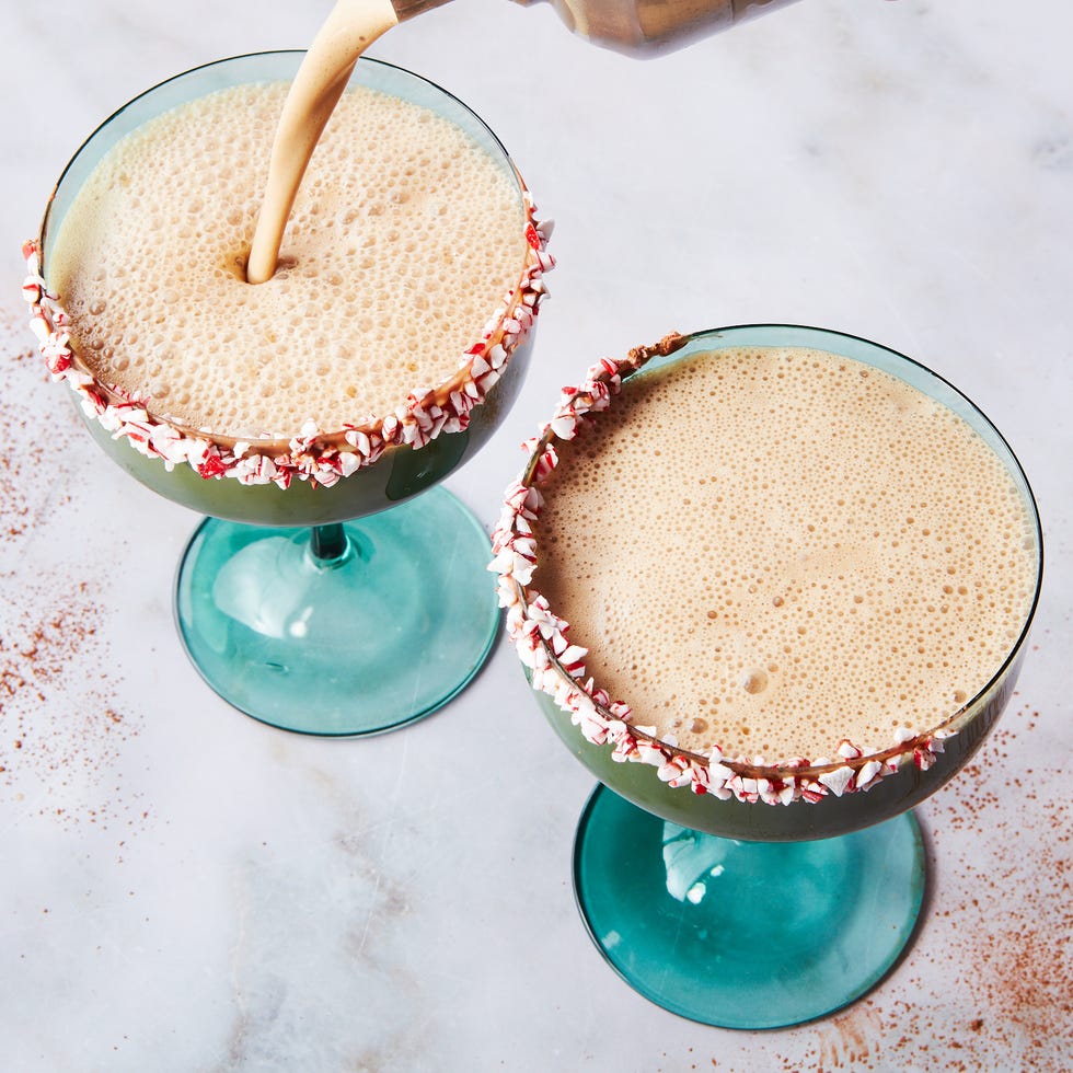 pouring an eggnog espresso martini pouring an eggnog espresso martini