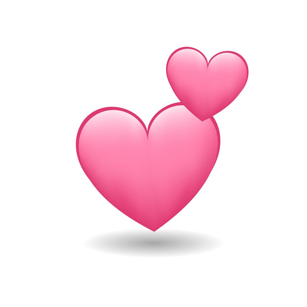 double pink heart emoji with a large and small heart