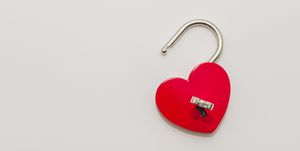 heart shaped red lock with key