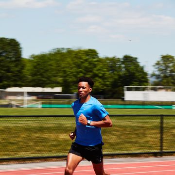 a person running Grey on a track
