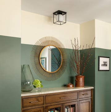 room with green and cream two tone wall room with green and cream two tone wall