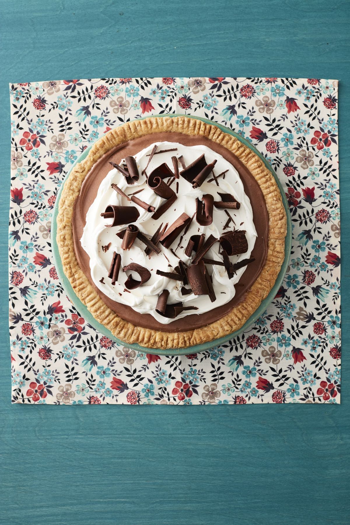 chocolate cream pie on floral napkin