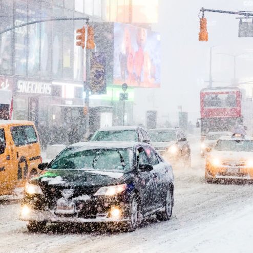 Heavy snow seen falling at Times Square.
   New York city is...