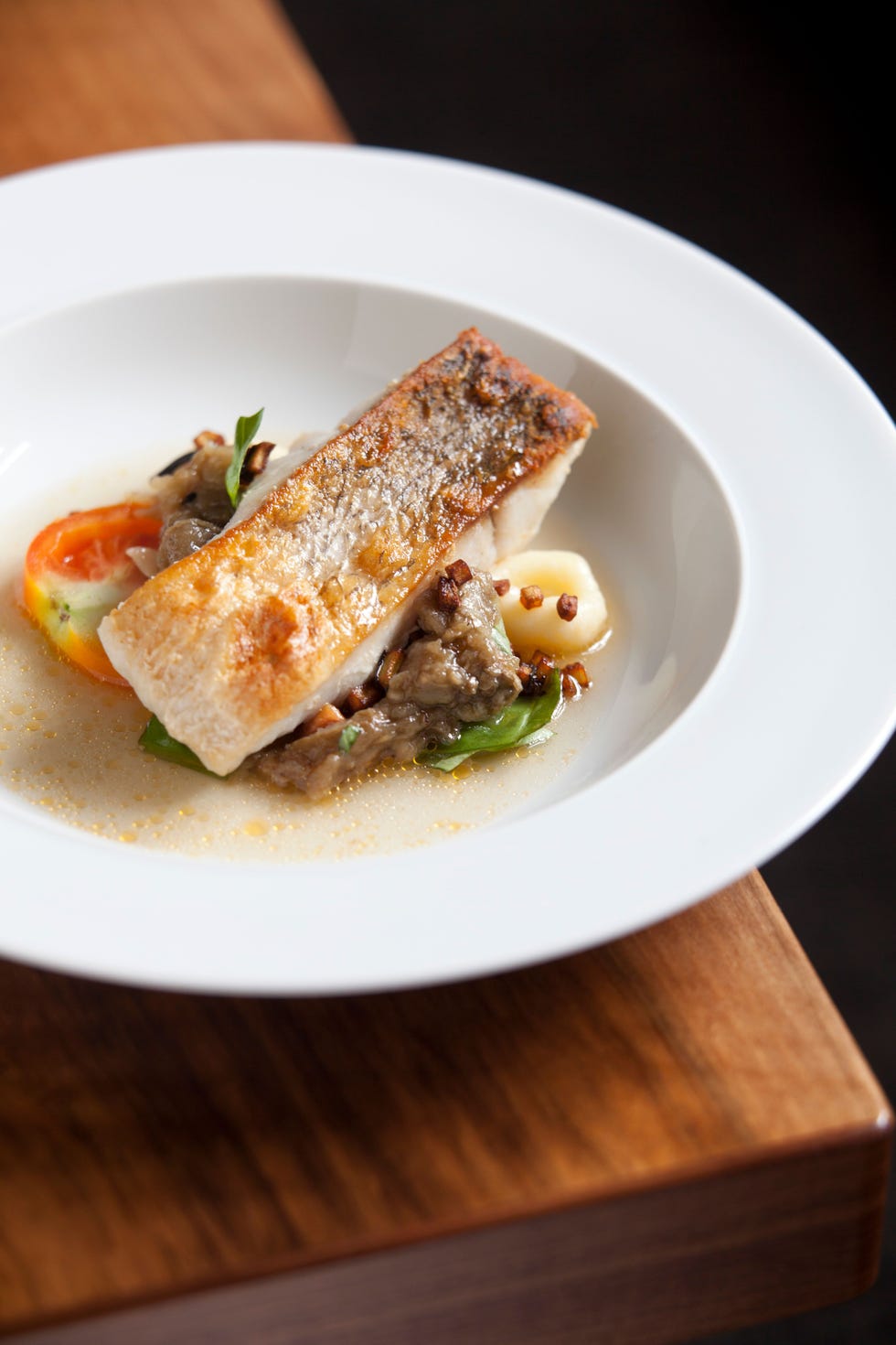 Snoek met aubergine in restaurant Mangold