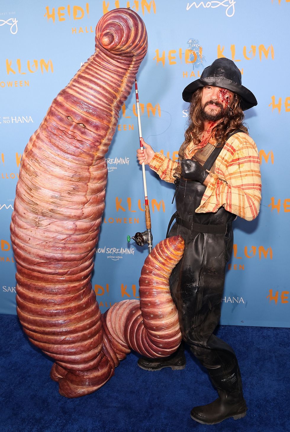 heidi klum's hallowe'en party 2022 dressed as a worm with fisherman husband