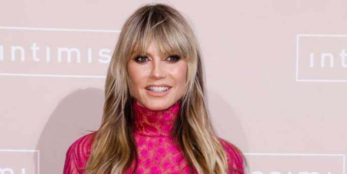 Heidi Klum, 50, Poses Naked on Shag Couch Ahead of Halloween Party