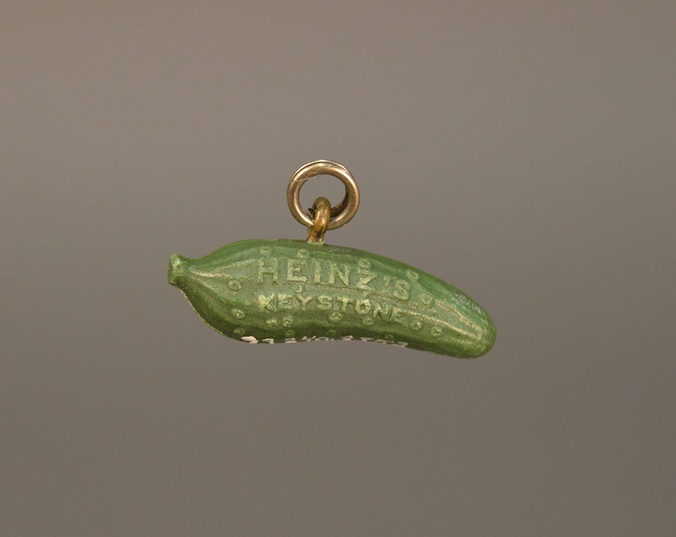 Green, Leaf, Organism, Plant, Fashion accessory, Legume, Pendant, Jewellery, Metal, 