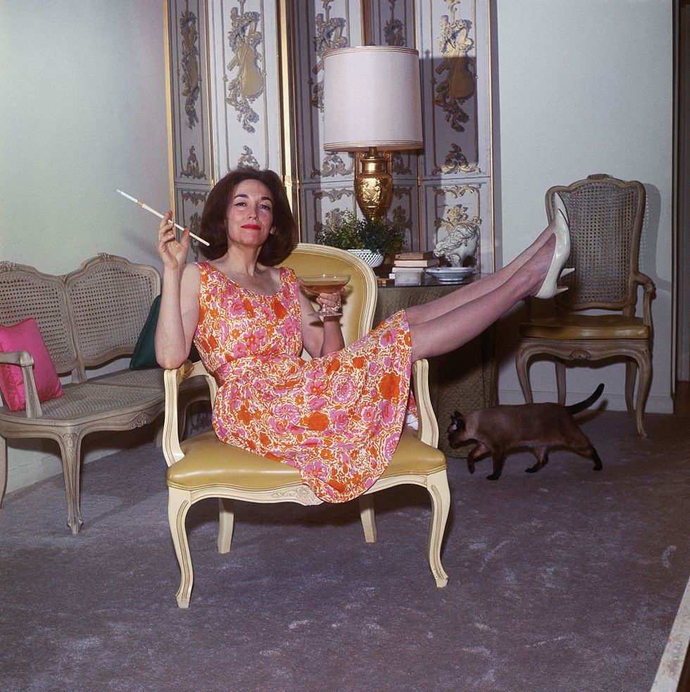 original caption helen gurly brown, author of sex and the single girl, relaxes and works in her park avenue apartment