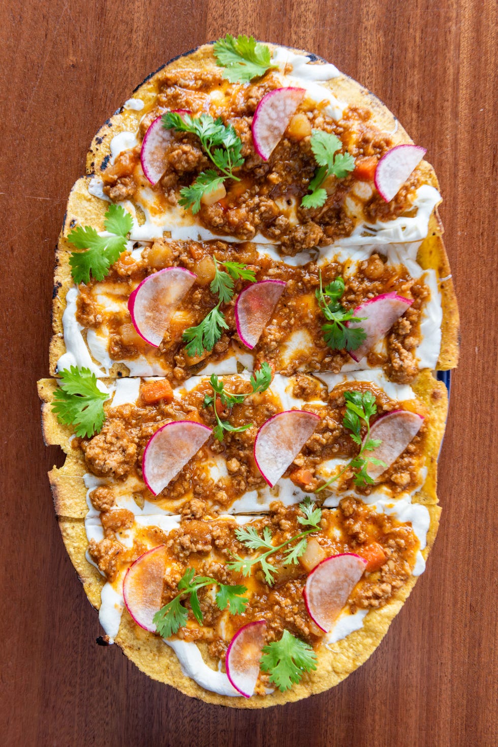 open face quesadilla, pork picadillo, oaxacan cheese, radish, cilantro