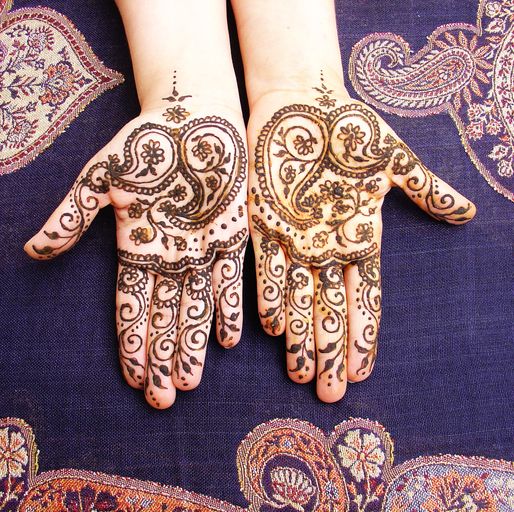 henna with indian paisley on two hands