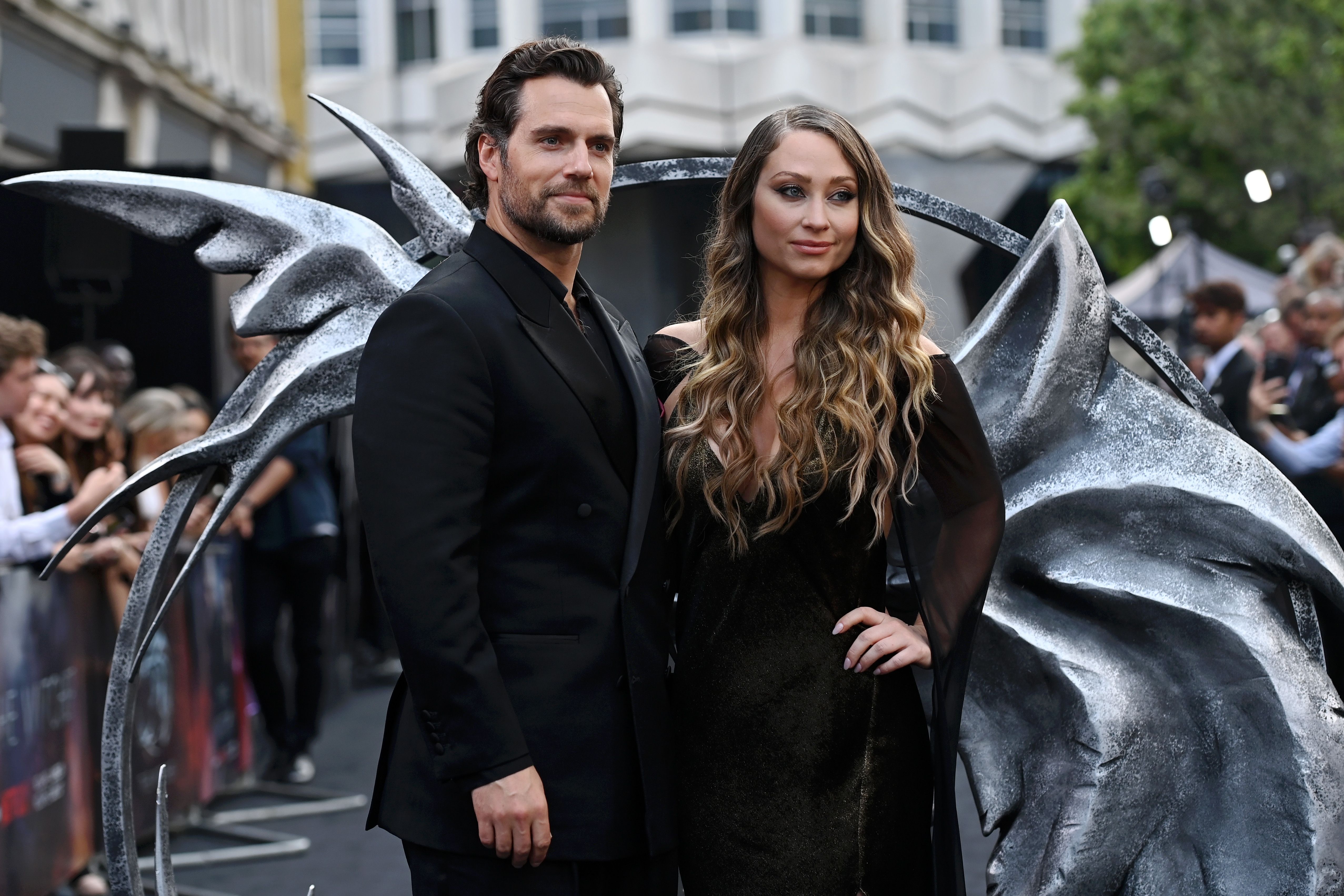 The Witcher star Henry Cavill goes public with his new girlfriend on dog  walk