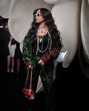 her wears chanel separates and a chanel bag at the chanel fall 2023 paris fashion week