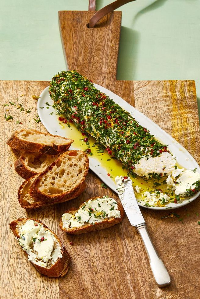 https://hips.hearstapps.com/hmg-prod/images/herb-goat-cheese-with-pink-peppercorns-1612982591.jpg?crop=0.668xw:1.00xh;0.214xw,0&resize=980:*