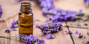 Herbal oil and lavender flowers