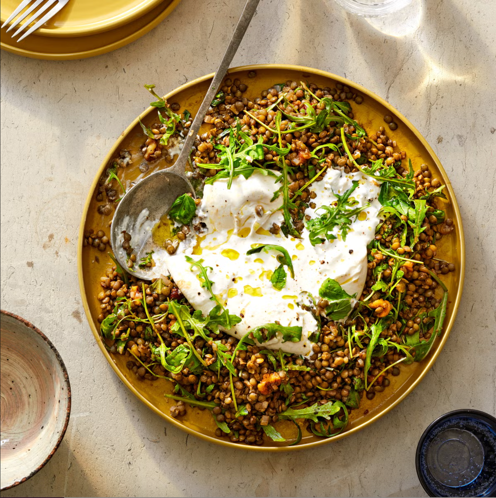 herby lentil and burrata salad on a plate