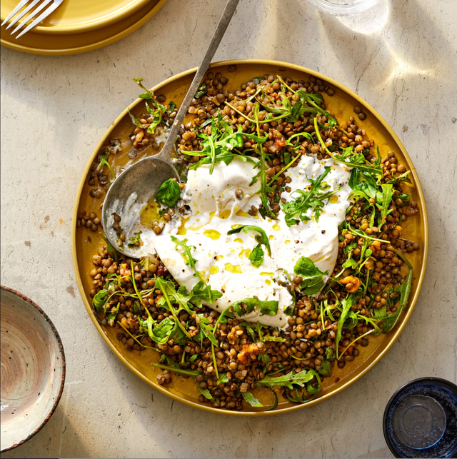 herby lentil and burrata salad on a plate