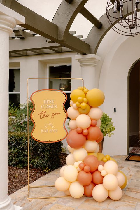 boy baby shower theme here comes the sun balloon garland and sign