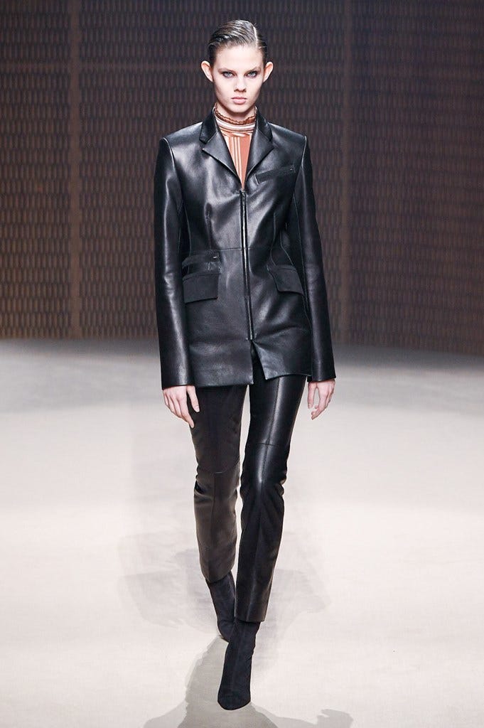 Fashion model, Fashion show, Fashion, Clothing, Runway, Leather, Human, Outerwear, Leather jacket, Jacket, 