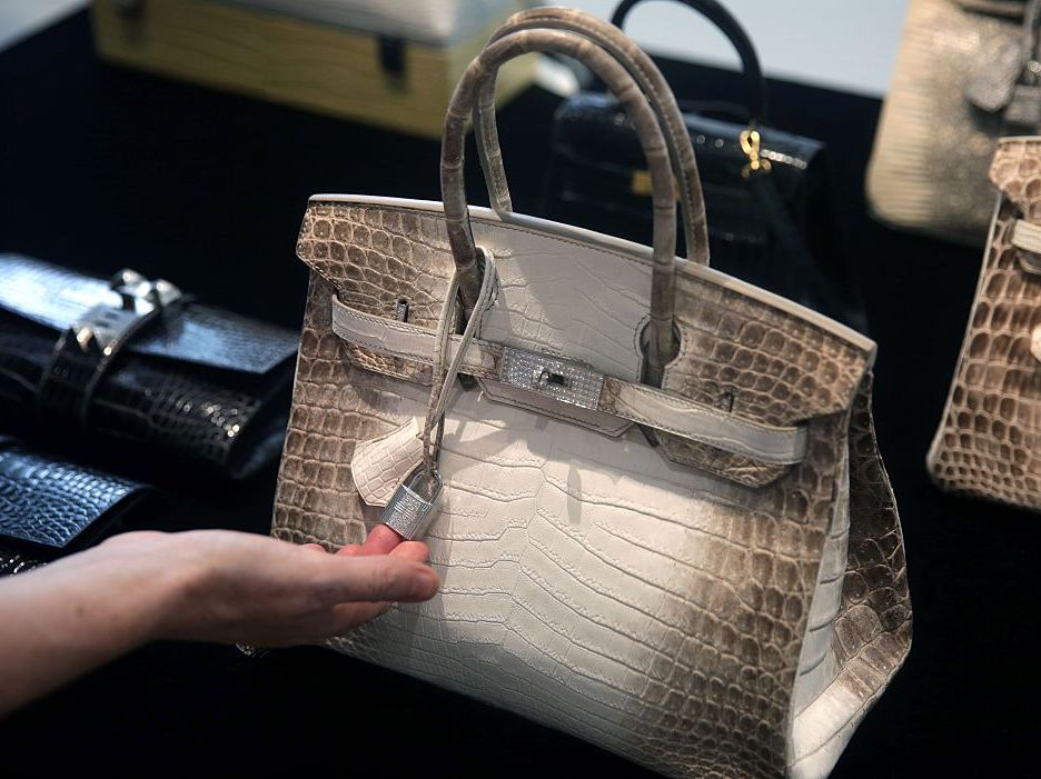 Romm Diamonds - A diamond-embellished Hermès Birkin became the most  expensive handbag ever sold at auction when it fetched $300,108 at  Christie's Hong Kong on Monday. The Himalaya Niloticus Crocodile Diamond  Birkin