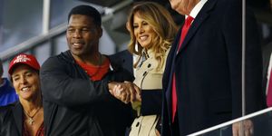 atlanta, georgia   october 30  former football player and political candidate herschel walker interacts with former president of the united states donald trump prior to game four of the world series between the houston astros and the atlanta braves truist park on october 30, 2021 in atlanta, georgia photo by michael zarrilligetty images