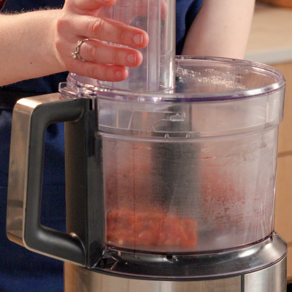 blitzing tomato mixture in a food processor