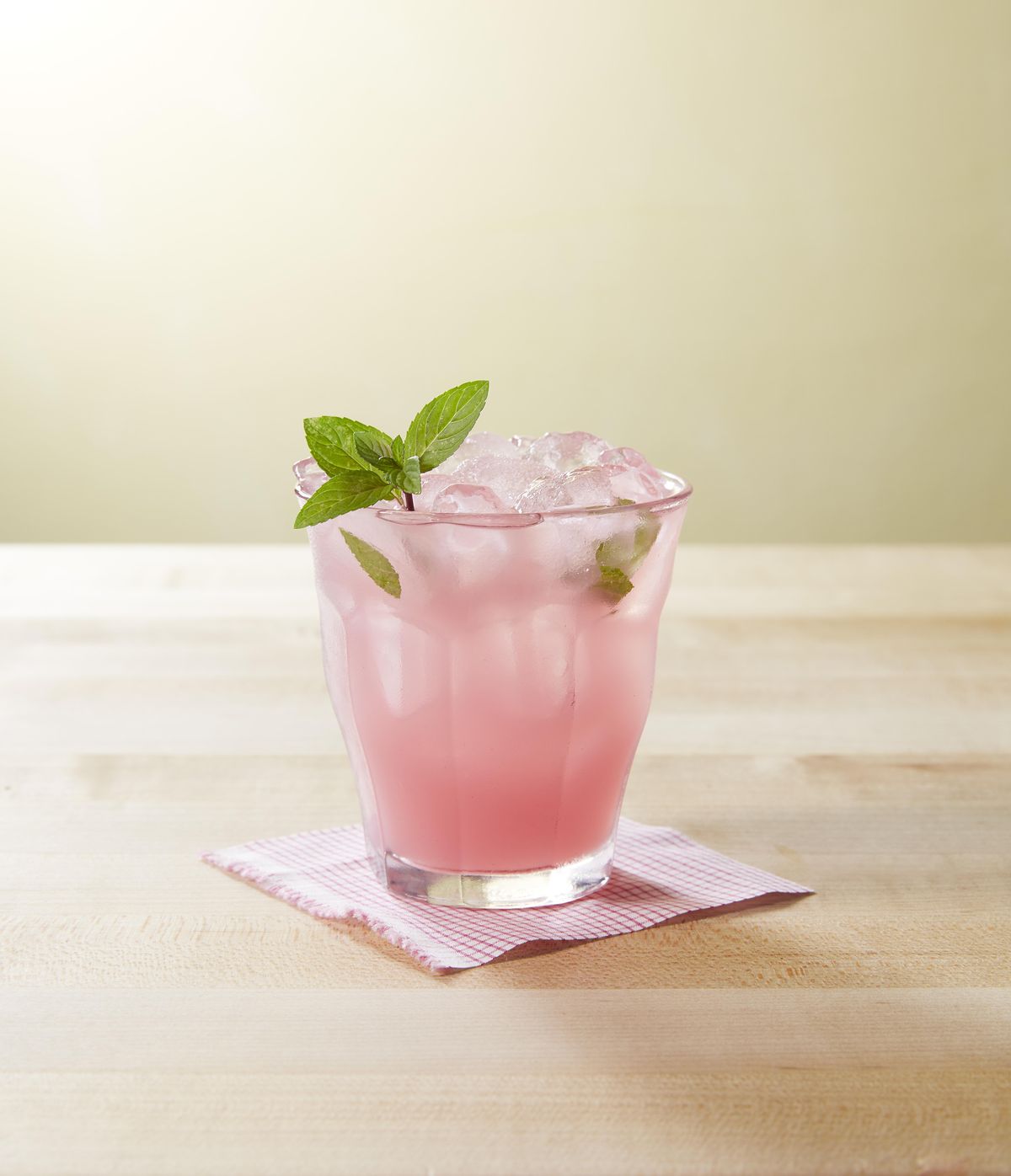 hibiscus mint lemonade with a fresh mint sprig