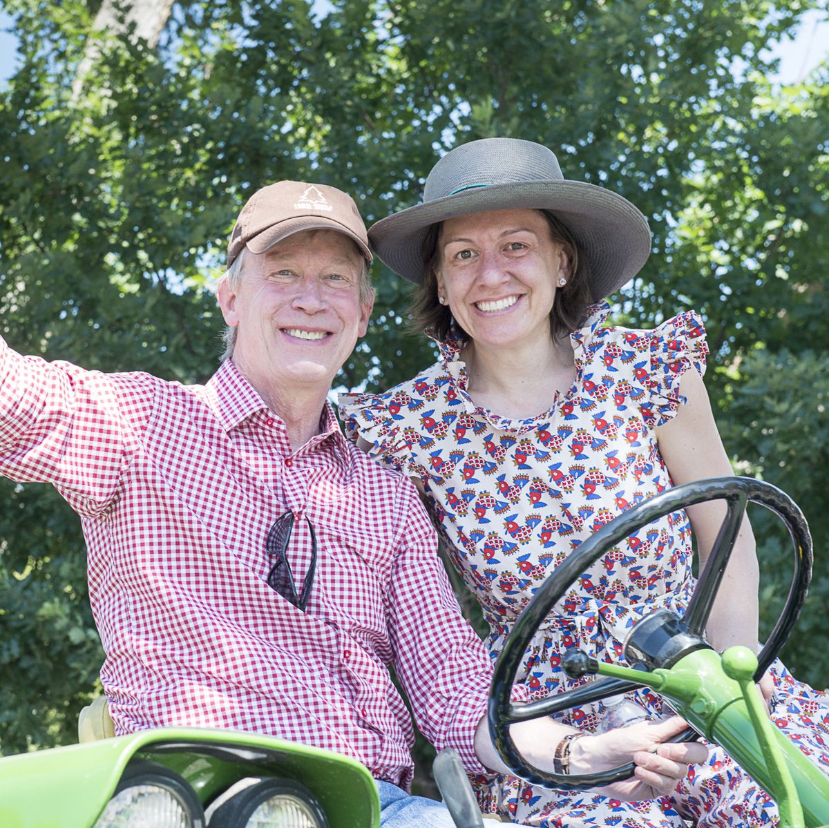 Democratic Presidential Candidate John Hickenlooper and his wife Robin Pringle
