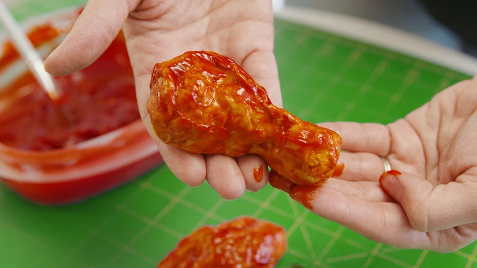 Food, Dish, Chicken meat, Cuisine, Ingredient, Fried food, Hand, Chicken lollipop, Finger, Fried chicken, 