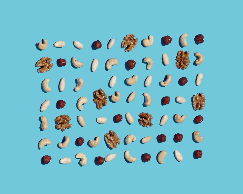 High angle view of nuts on blue background