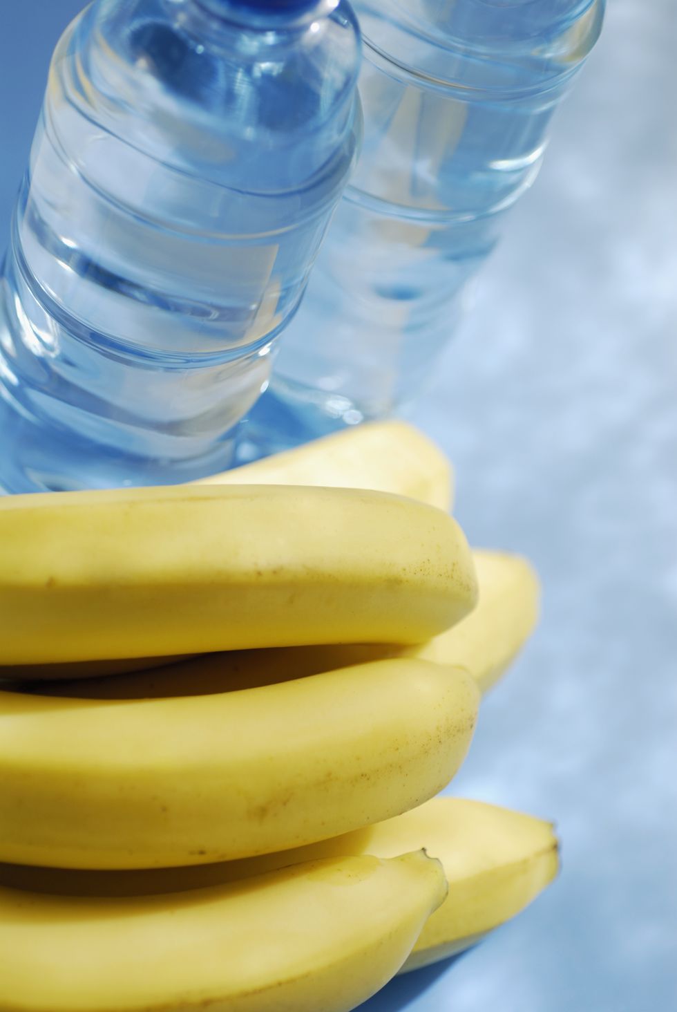 high angle view of bananas and two water bottles