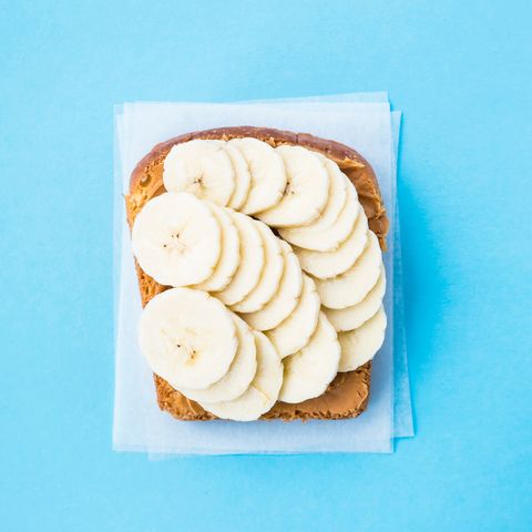 High Angle View Of Bread With Banana Slices On Table