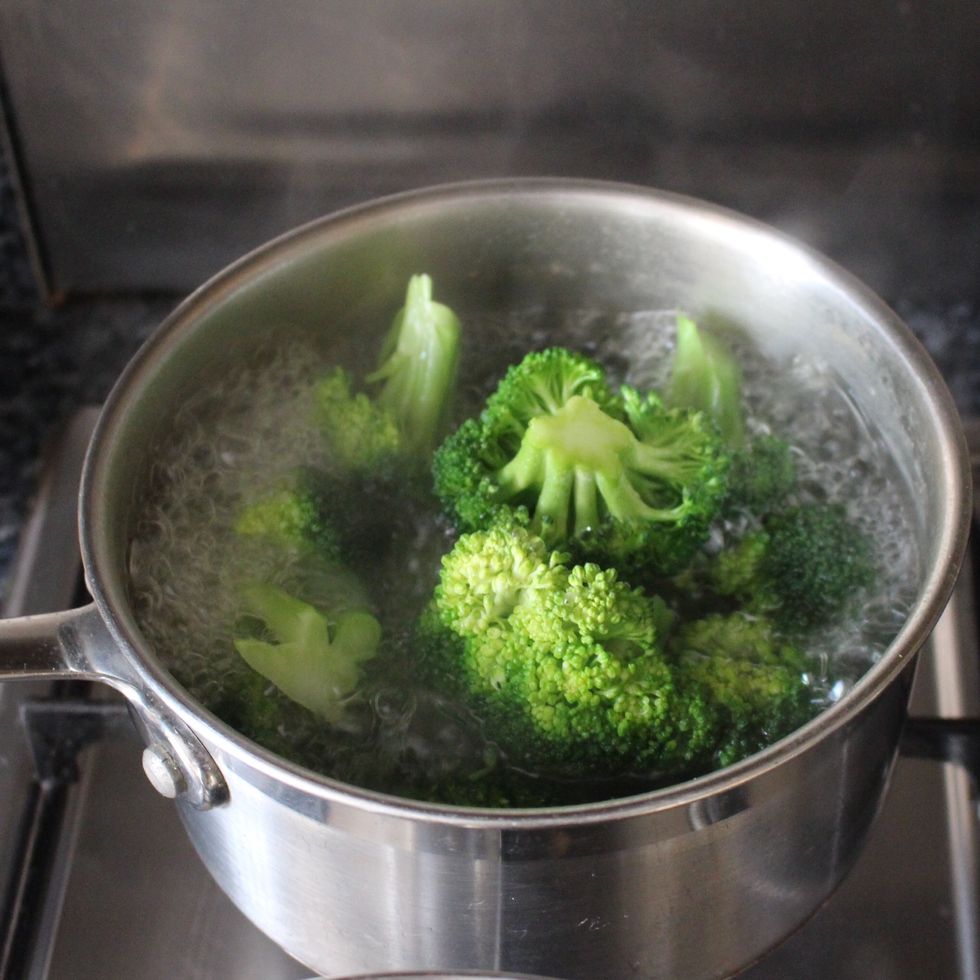 high angle view of broccoli in boiling water