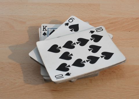 High Angle View Of Cards On Table