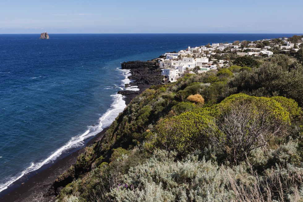 High angle view of cliff and ocean on Stromboli coastline, Messina, Sicily