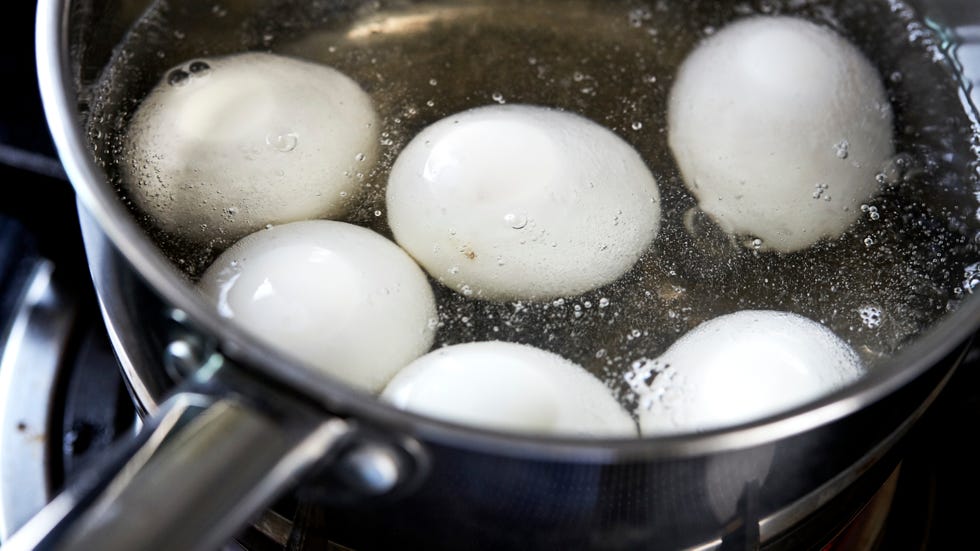 High Angle View Of Eggs Boiling In Water